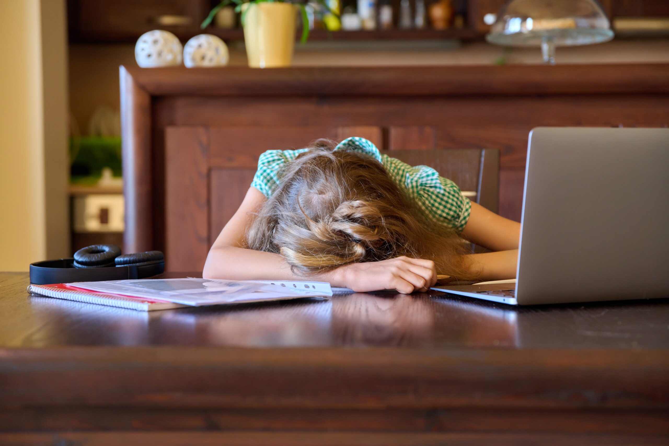 Teen reviewing quiz mistakes with a tutor online